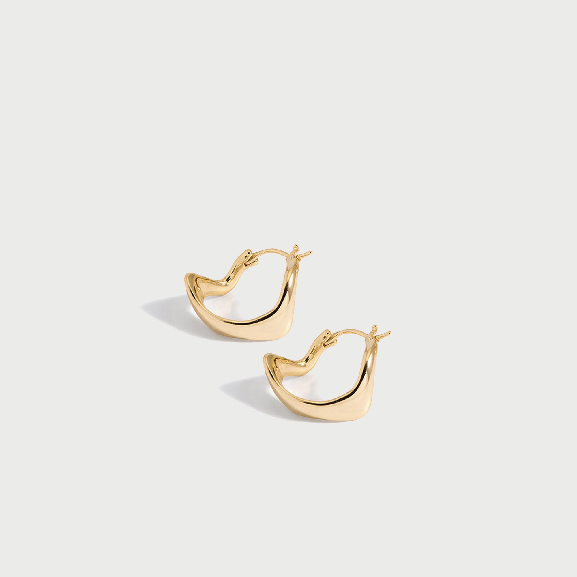 Curved Mini Hoop Earrings in Gold