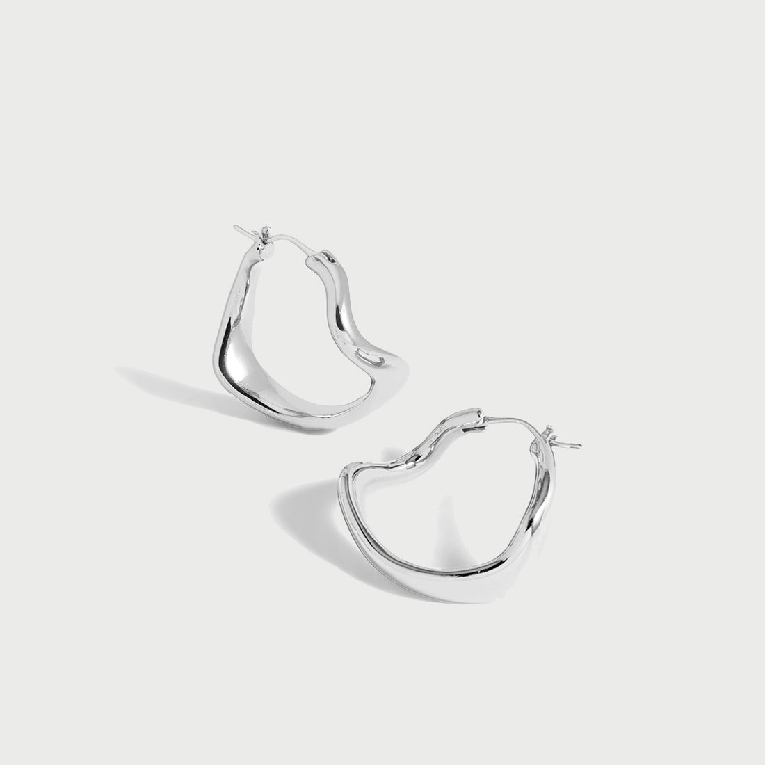 Curved Maxi Hoop Earrings in Silver