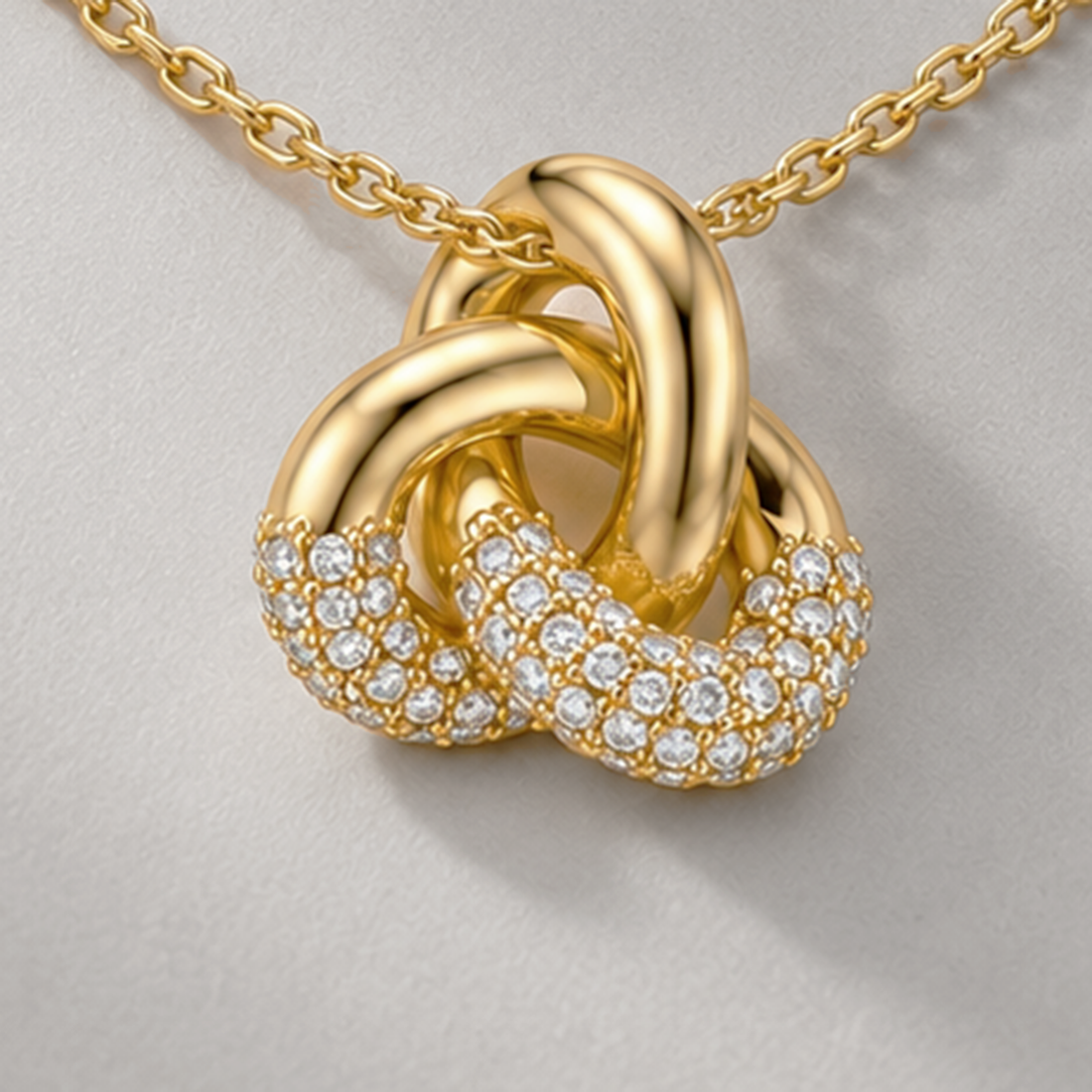 KNOT PAVE CRYSTAL NECKLACE IN GOLD