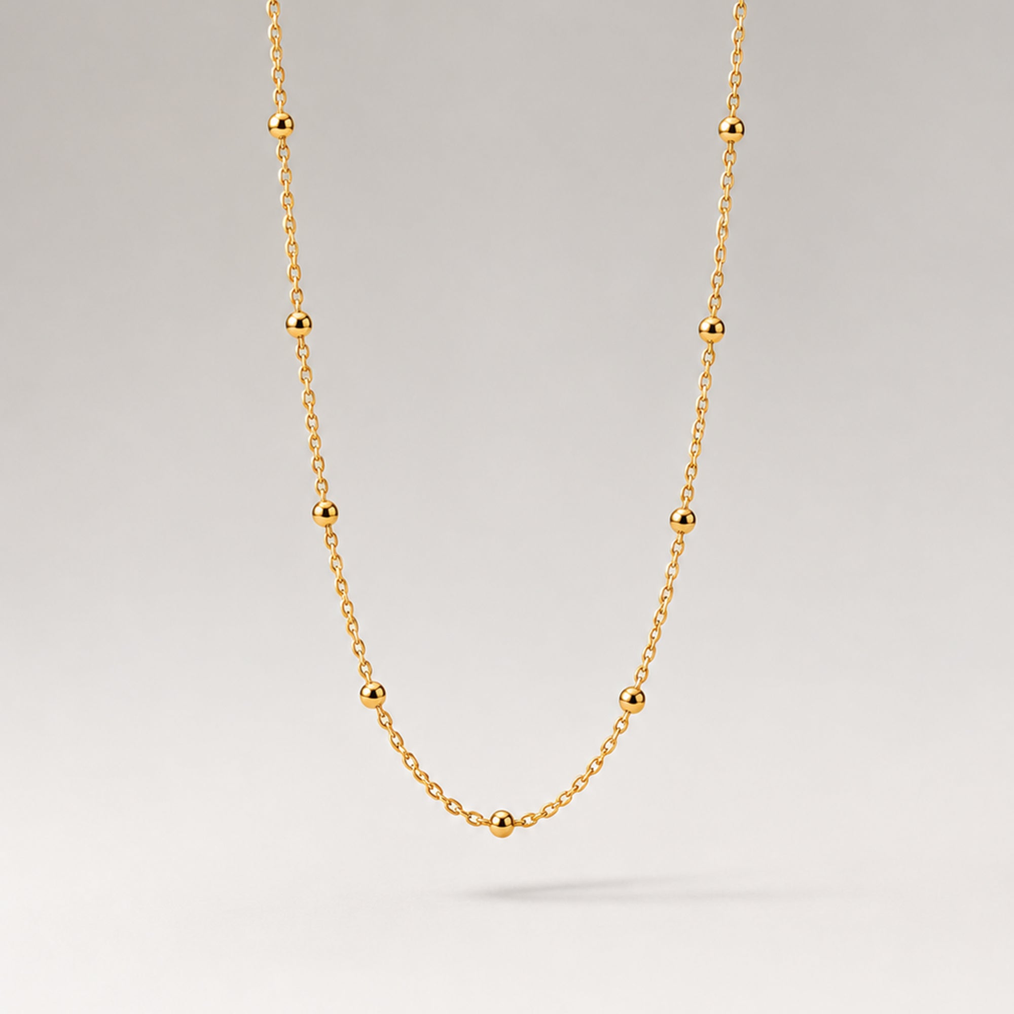 FALVO BEADED CHOKER NECKLACE IN GOLD