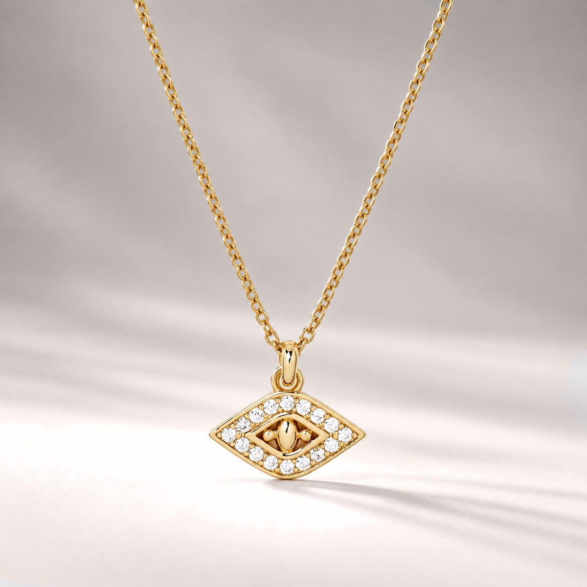 EVIL EYE PENDANT SHORT NECKLACE IN GOLD & CRYSTALS