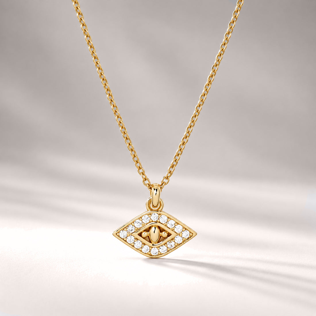 EVIL EYE PENDANT SHORT NECKLACE IN GOLD & CRYSTALS