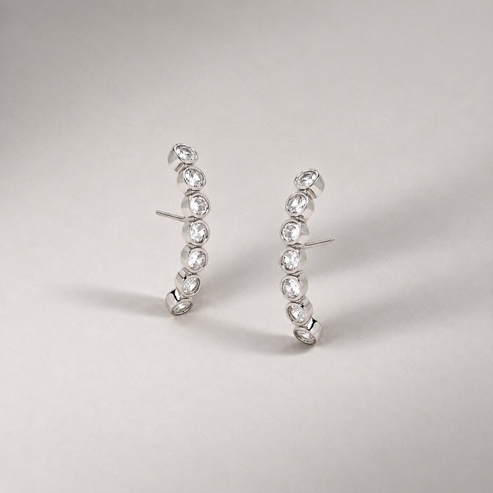 Averto Face On Stud Earrings in Silver and Crystals