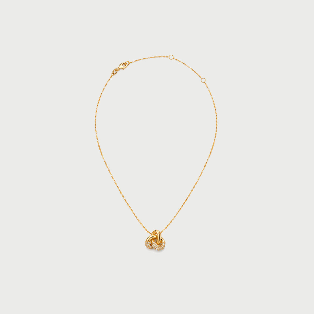 KNOT PAVE CRYSTAL NECKLACE IN GOLD