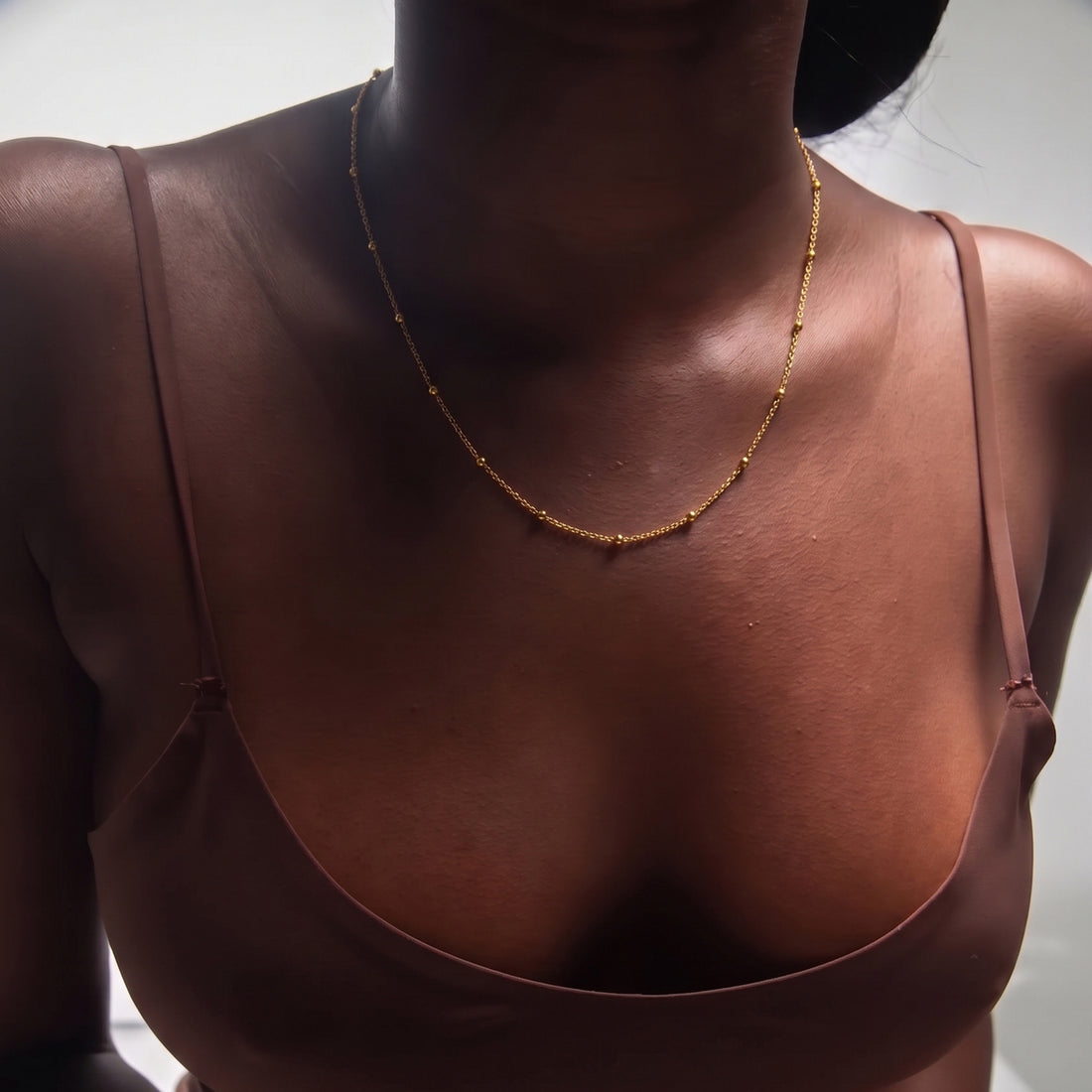 FALVO BEADED CHOKER NECKLACE IN GOLD