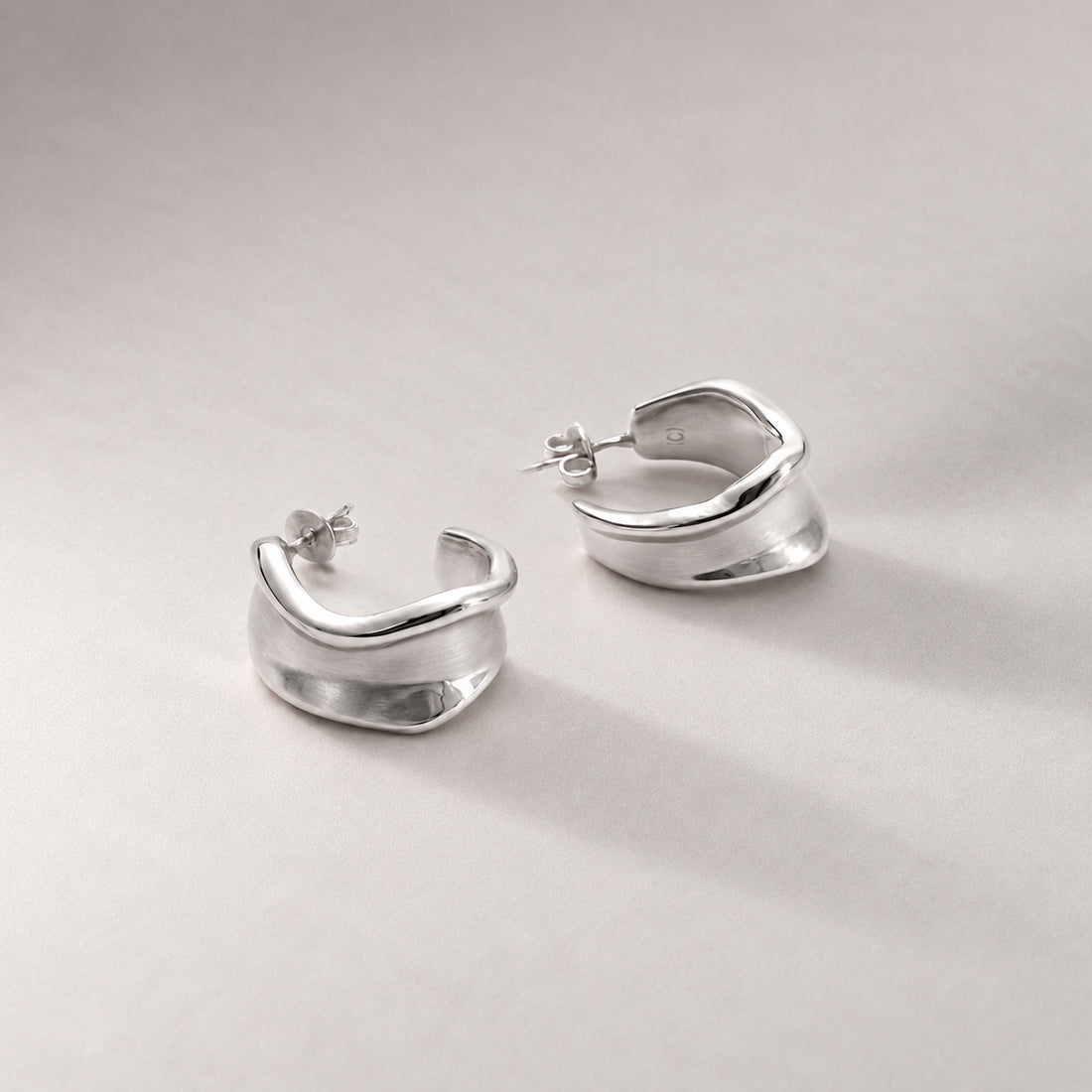 Molten Curve Earring in Silver