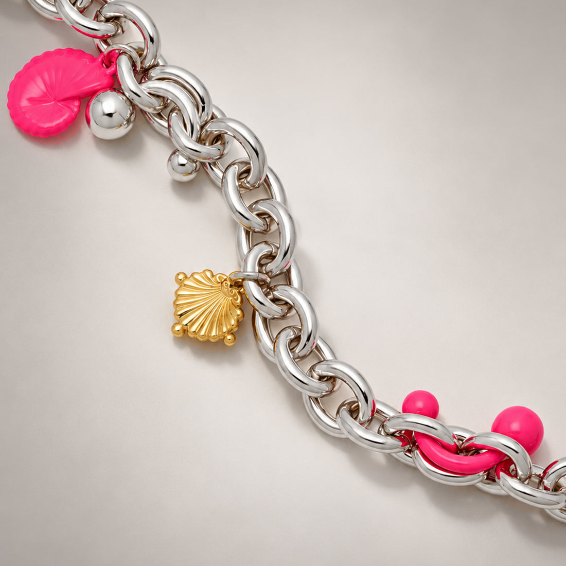 Coral Charm Bracelet in Silver and Pink