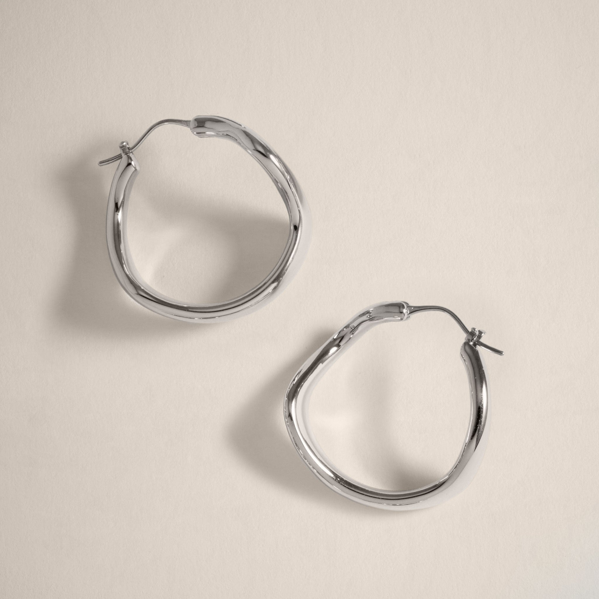 Curved Maxi Hoop Earrings in Silver