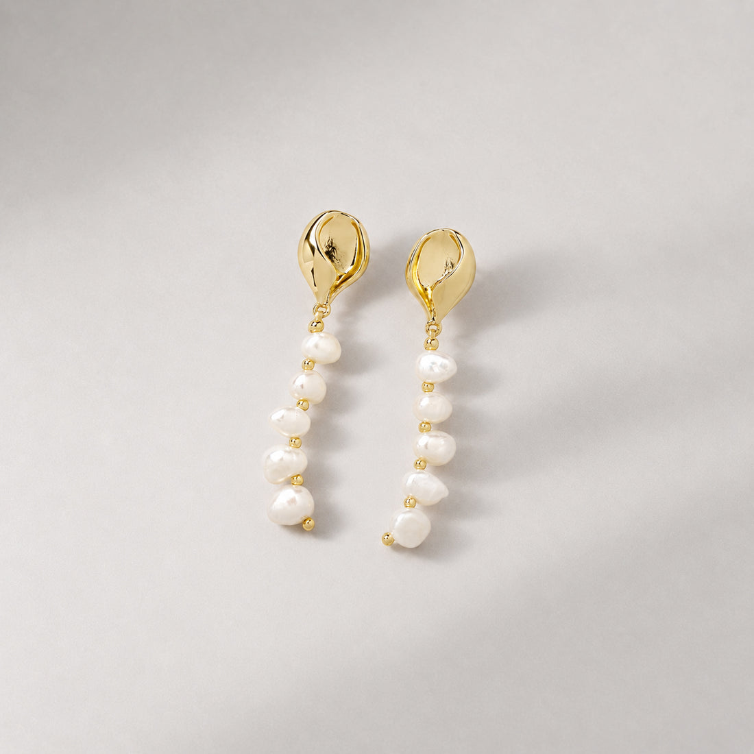MIPOS PEARL CHARM DROP EARRINGS IN GOLD & PEARLS