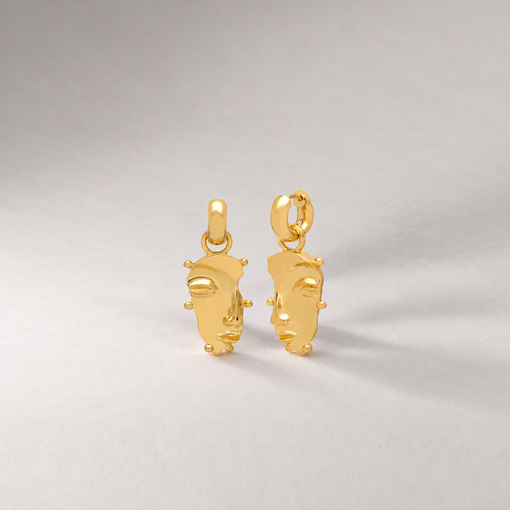 Visage Drop Hoop Earrings in Gold