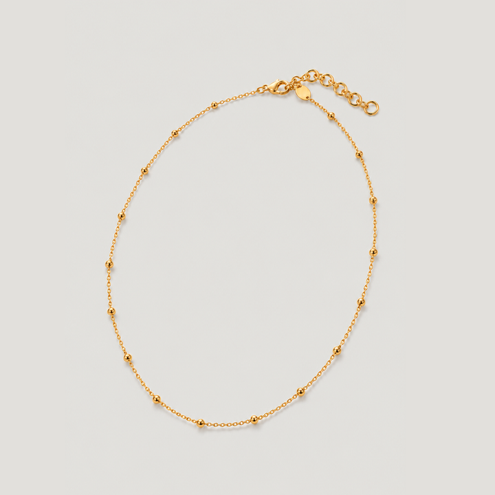 FALVO BEADED CHOKER NECKLACE IN GOLD