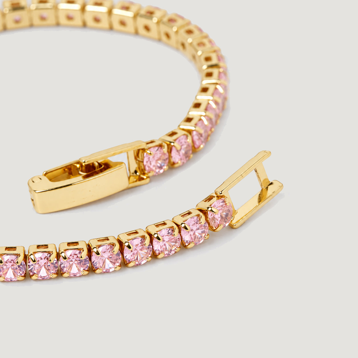 TENNIS BRACELET IN GOLD AND PINK CRYSTALS