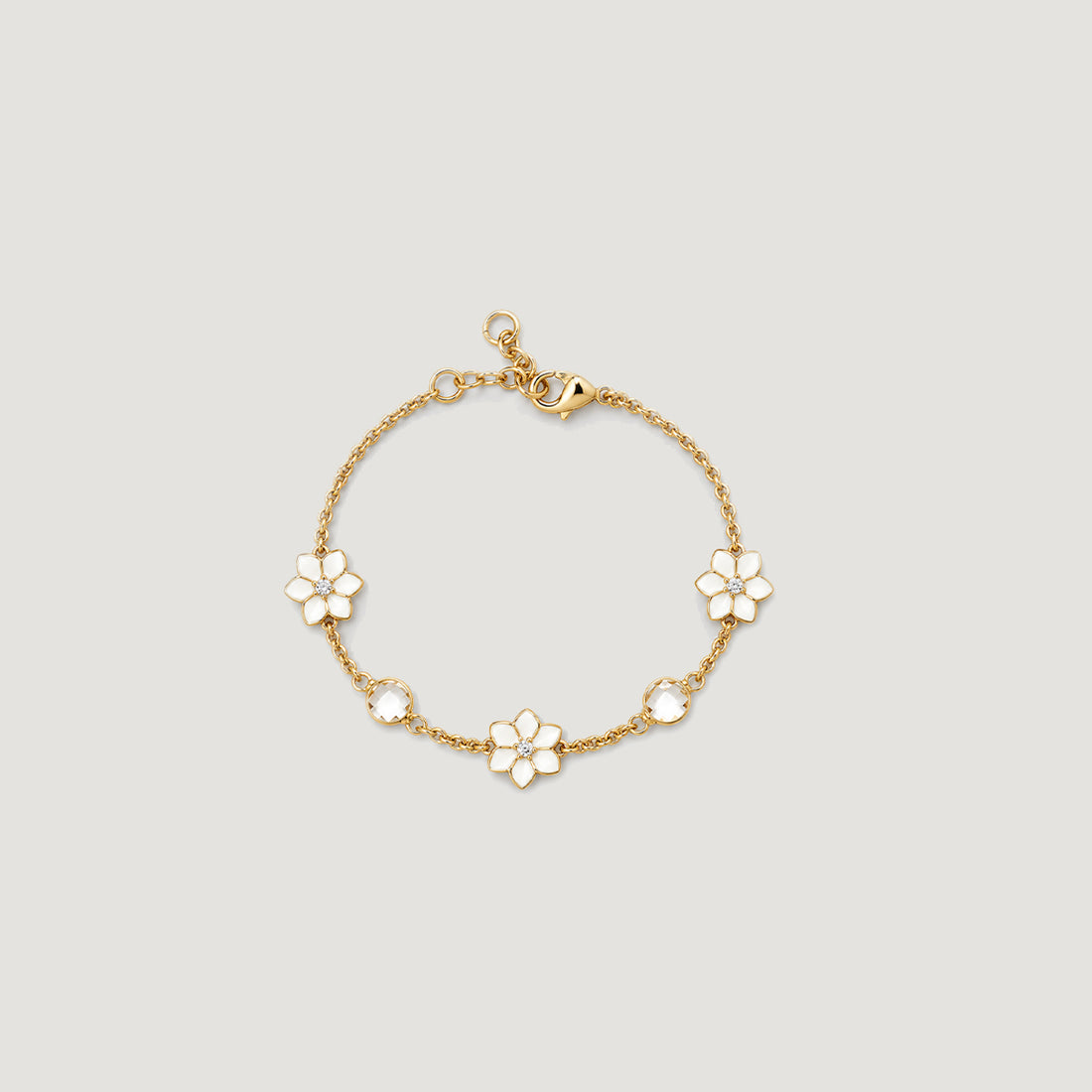 XANTIA FLOWER STONE STATION BRACELET IN GOLD & MOONSTONE WITH WHTE ENAMEL