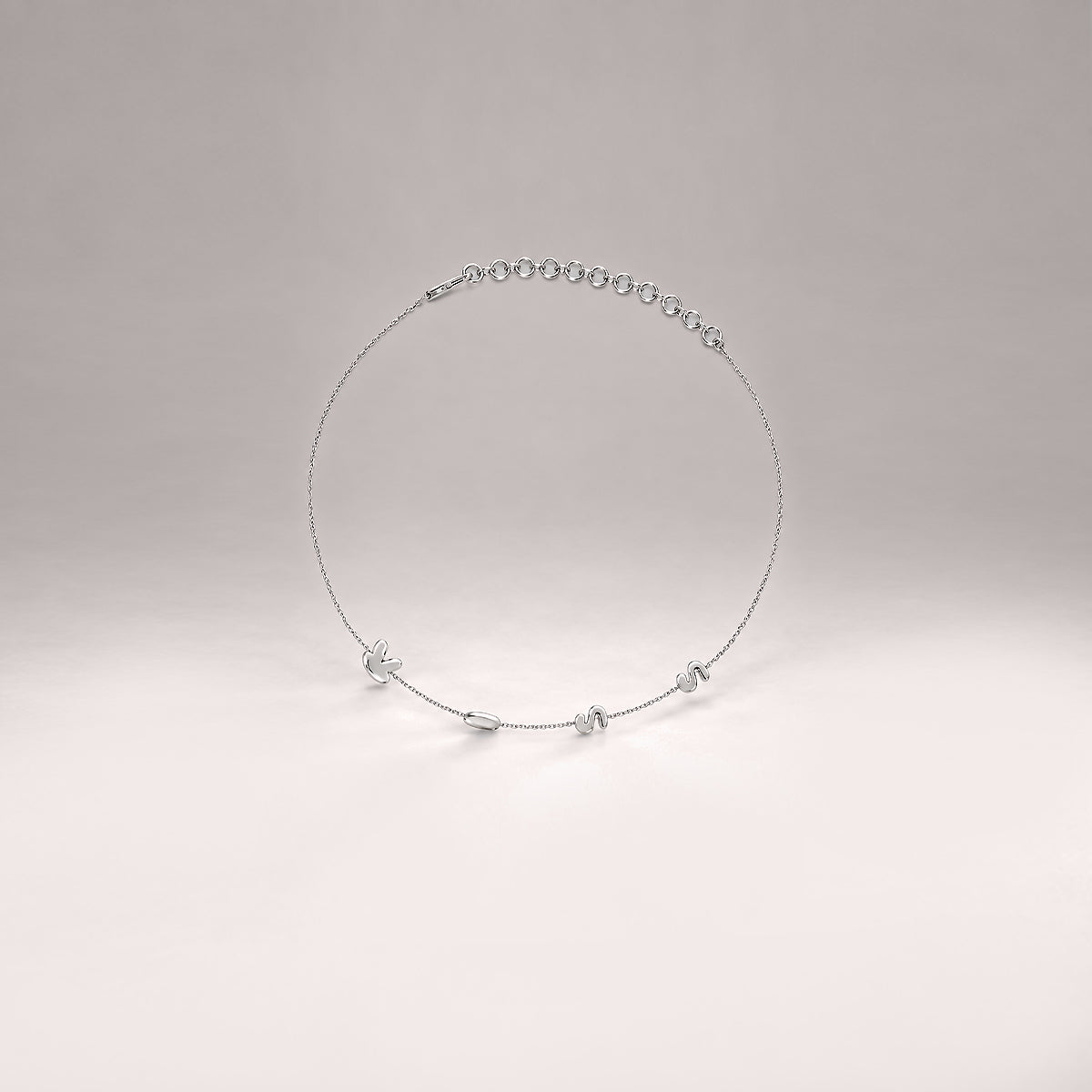 Kiss Necklace in Silver