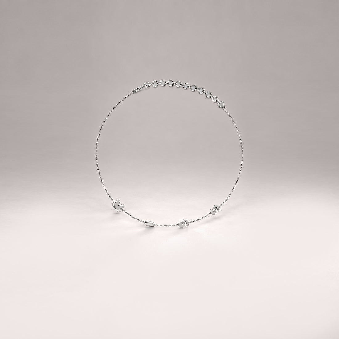 Kiss Necklace in Silver