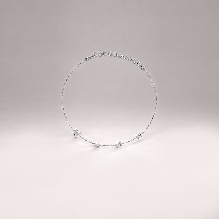 Kiss Necklace in Silver