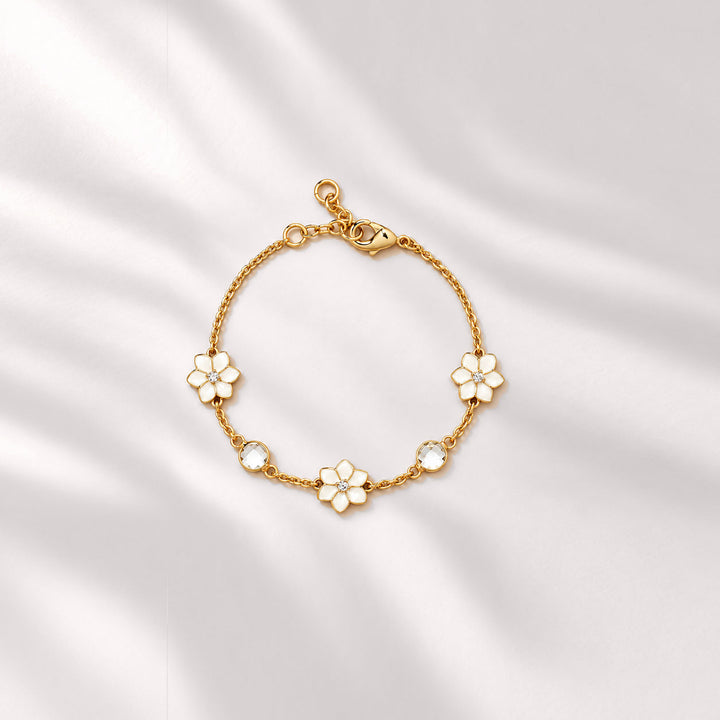 XANTIA FLOWER STONE STATION BRACELET IN GOLD & MOONSTONE WITH WHTE ENAMEL