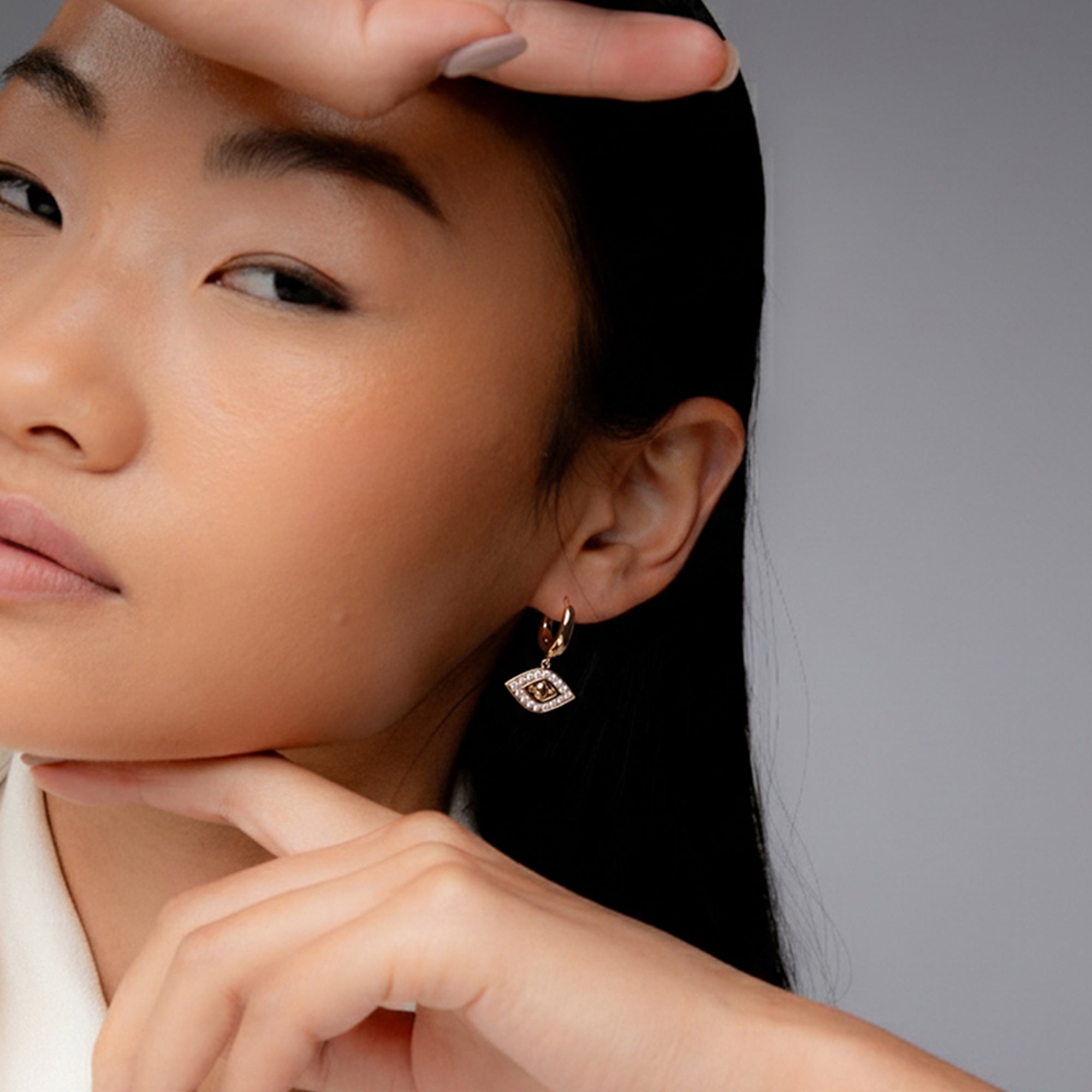 EVIL EYE DROP EARRINGS IN GOLD & CRYSTALS
