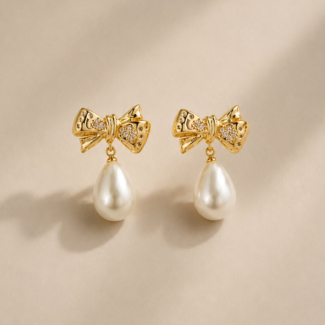 BOW PEARL EARRINGS DROP EARRINGS IN GOLD, CRYSTALS & PEARLS