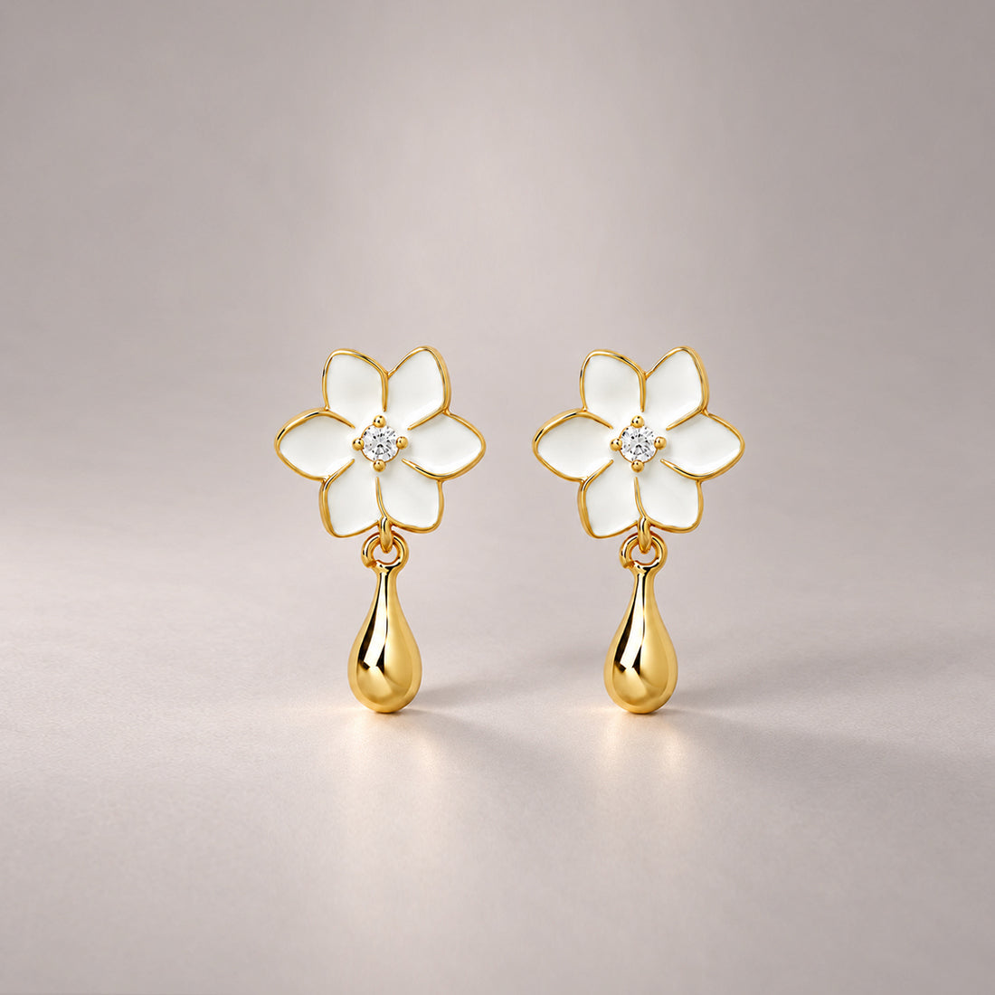 XANTIA FLOWER DROP EARRINGS IN GOLD & MOONSTONE WITH WHTE ENAMEL
