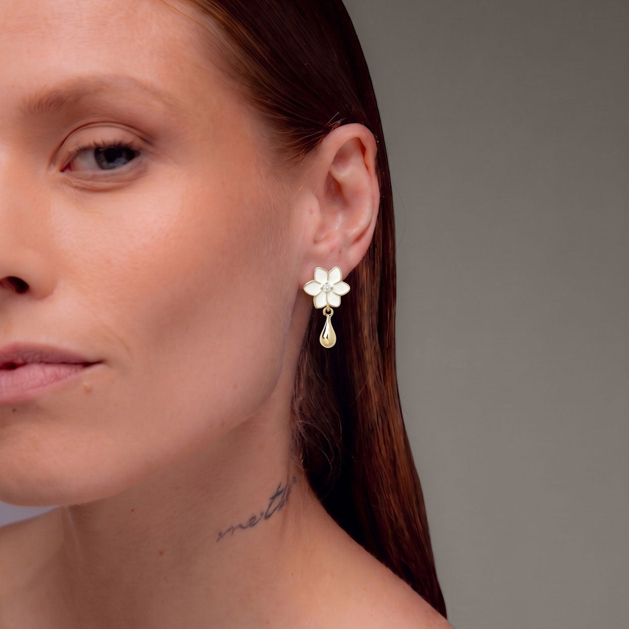 XANTIA FLOWER DROP EARRINGS IN GOLD & MOONSTONE WITH WHTE ENAMEL