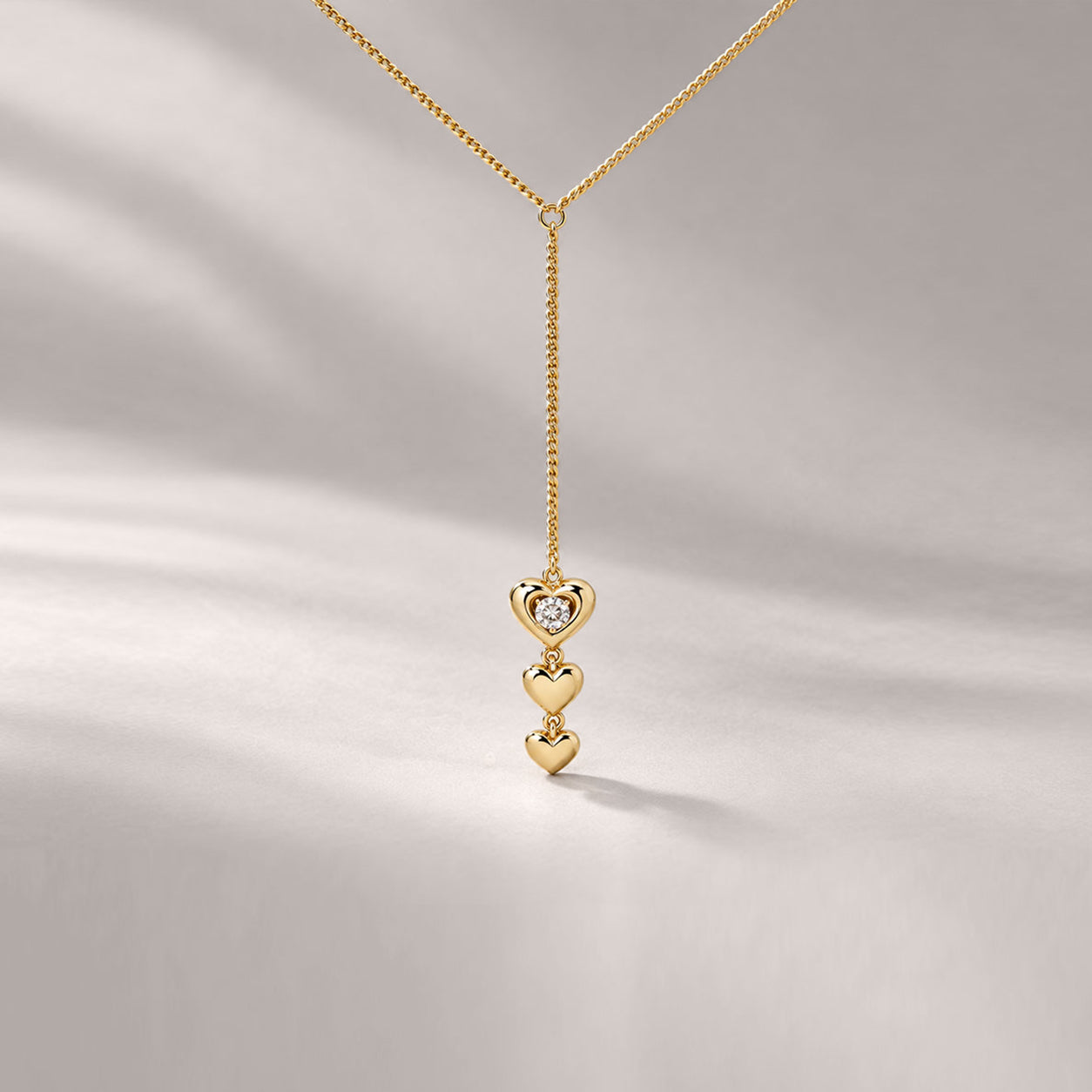 AFELLO LARIAT NECKLACE IN GOLD & CRYSTALS
