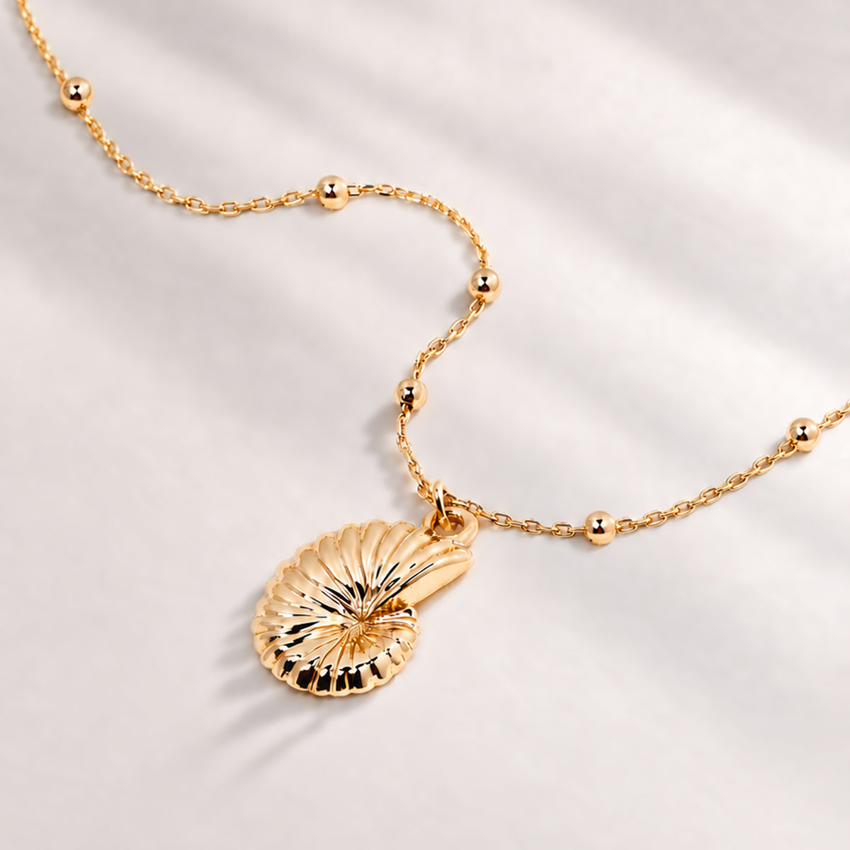 Coral Beaded Shell Chocker Necklace in Gold