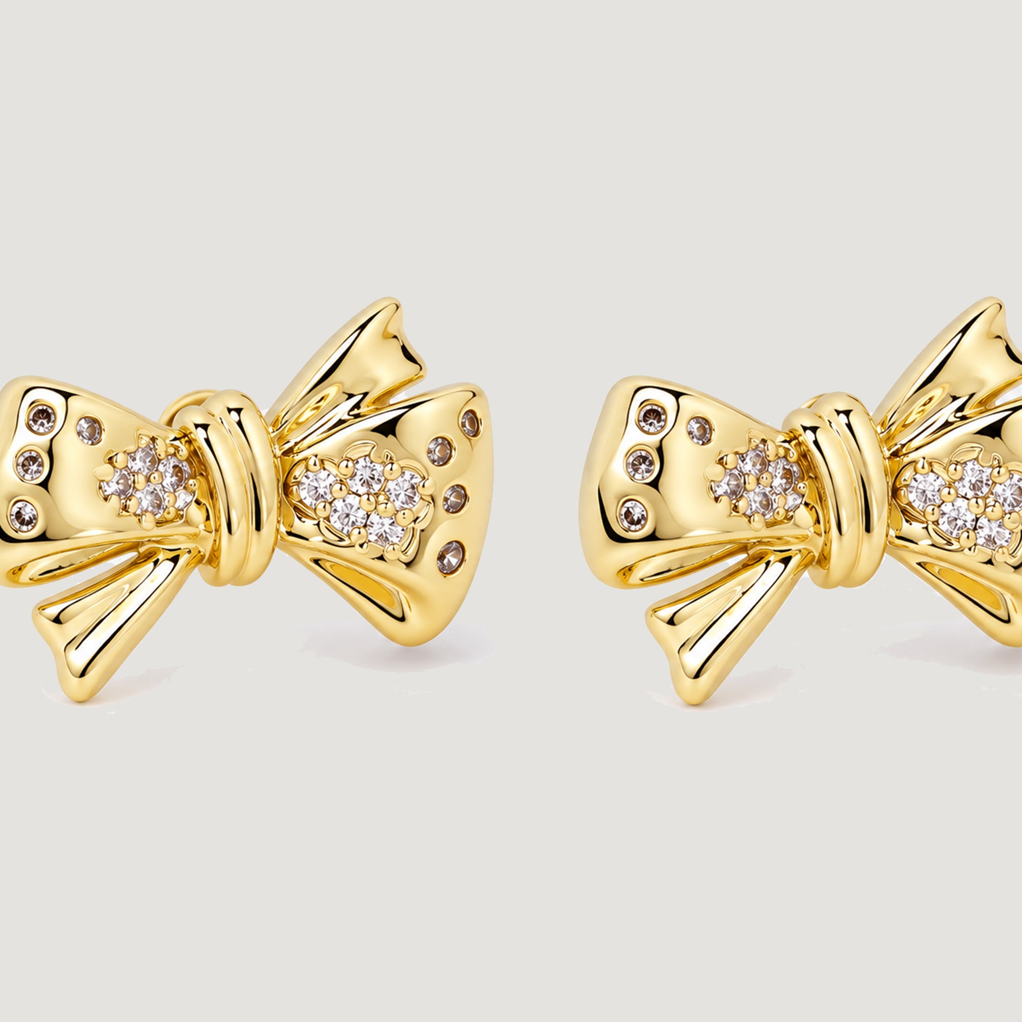 BOW MAXI STUD EARRINGS IN GOLD & CRYSTAL
