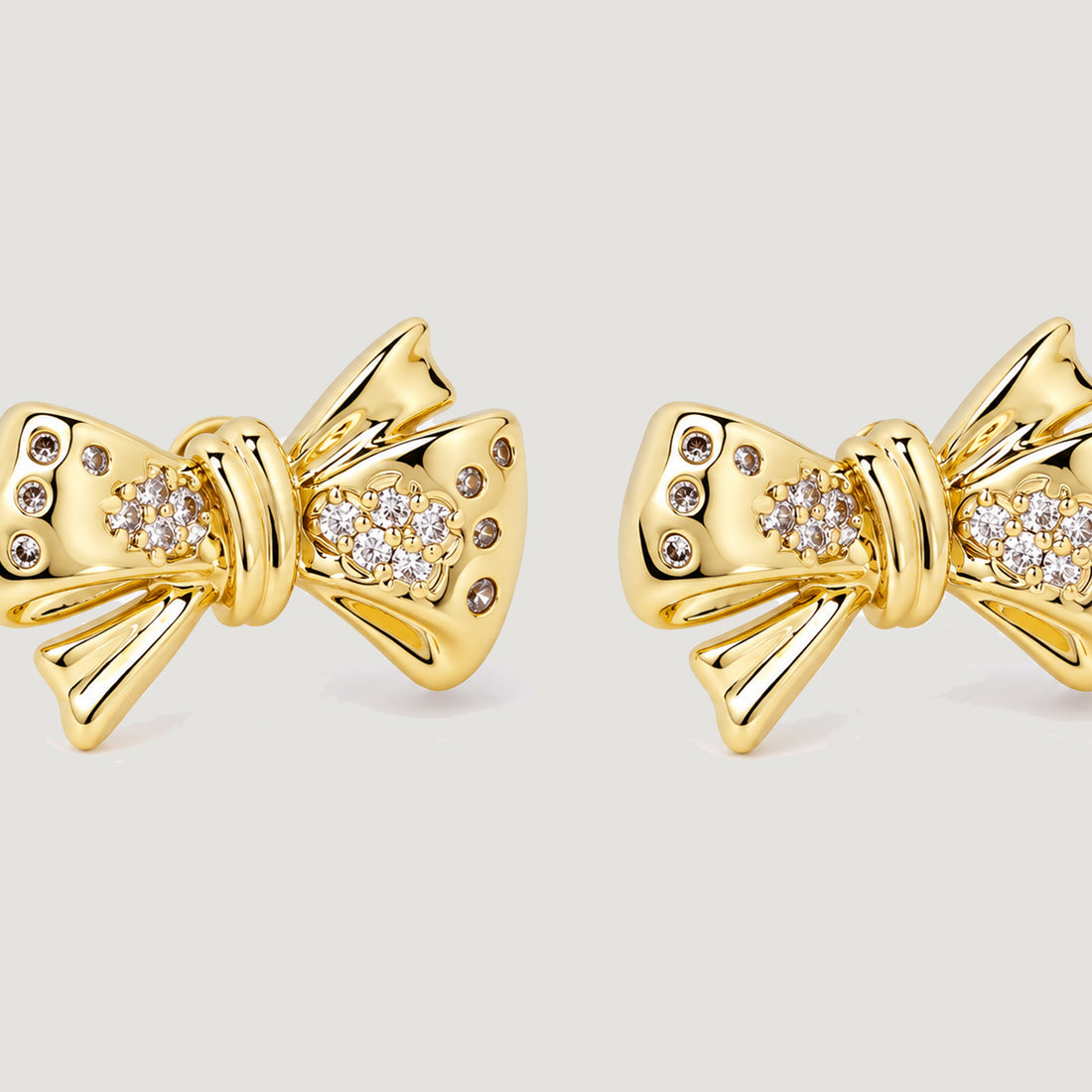 BOW MAXI STUD EARRINGS IN GOLD & CRYSTAL