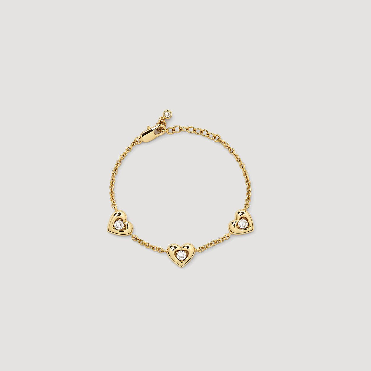AFELLO HEART CRYSTAL STATION BRACELET IN GOLD & CRYSTAL