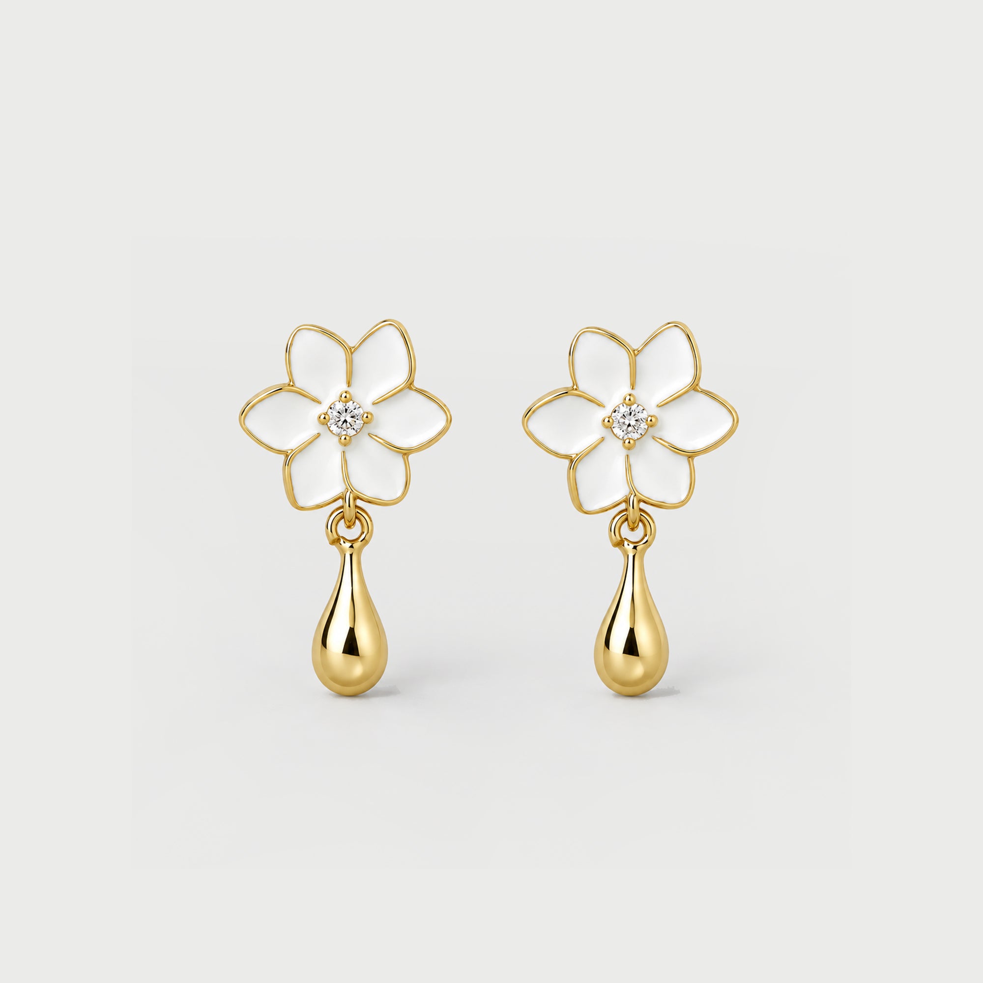 XANTIA FLOWER DROP EARRINGS IN GOLD & MOONSTONE WITH WHTE ENAMEL