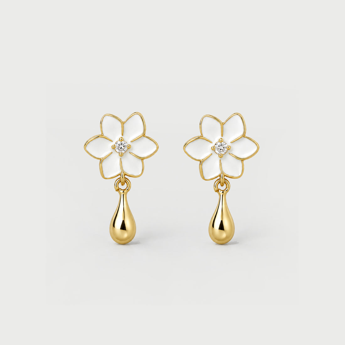 XANTIA FLOWER DROP EARRINGS IN GOLD & MOONSTONE WITH WHTE ENAMEL