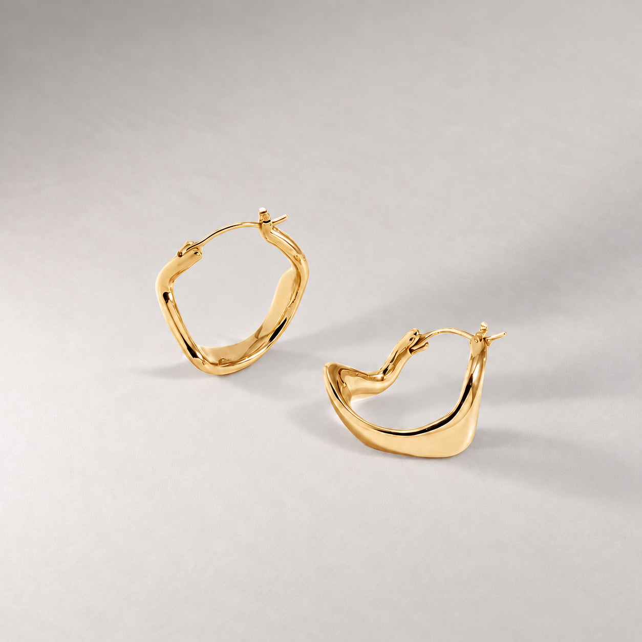 Curved Maxi Hoop Earrings in Gold