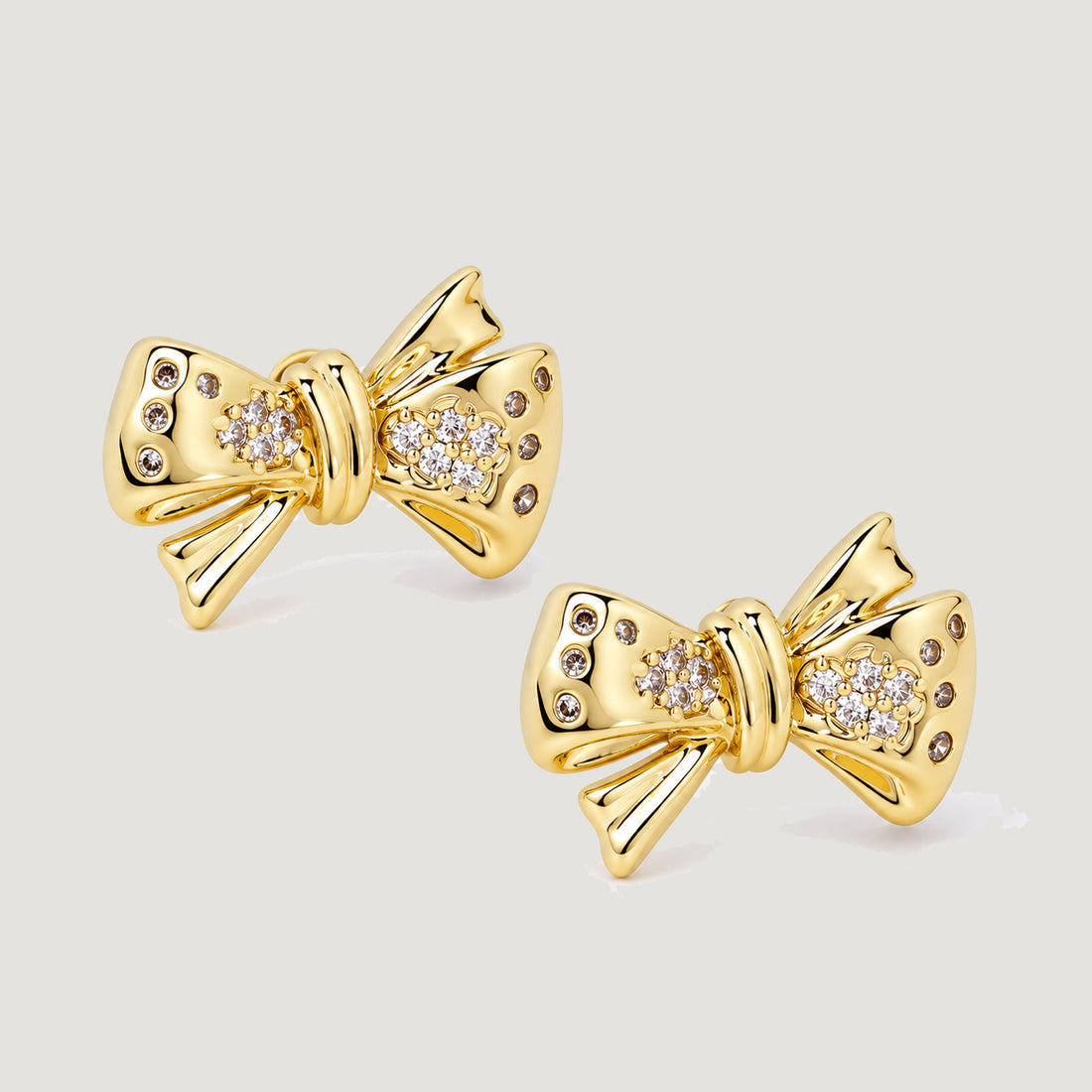 BOW MAXI STUD EARRINGS IN GOLD & CRYSTAL