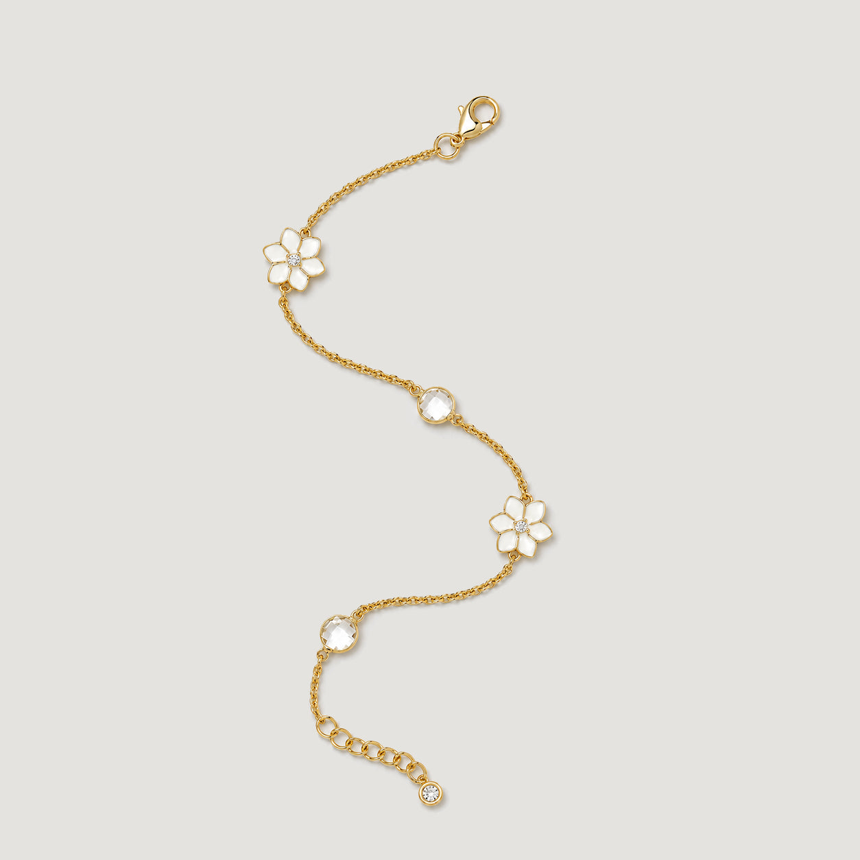 XANTIA FLOWER STONE STATION BRACELET IN GOLD & MOONSTONE WITH WHTE ENAMEL