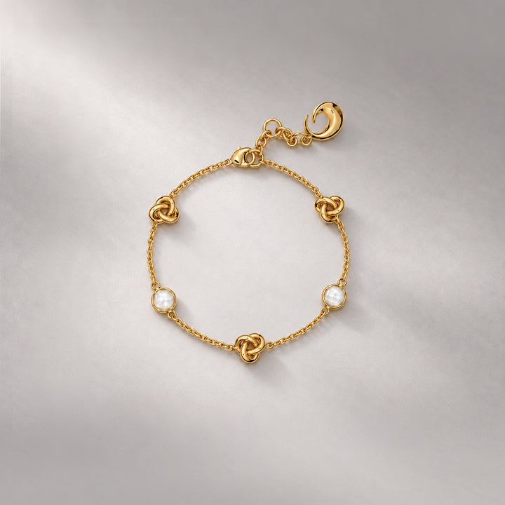 KNOT BRACELET IN GOLD AND CRYSTALS