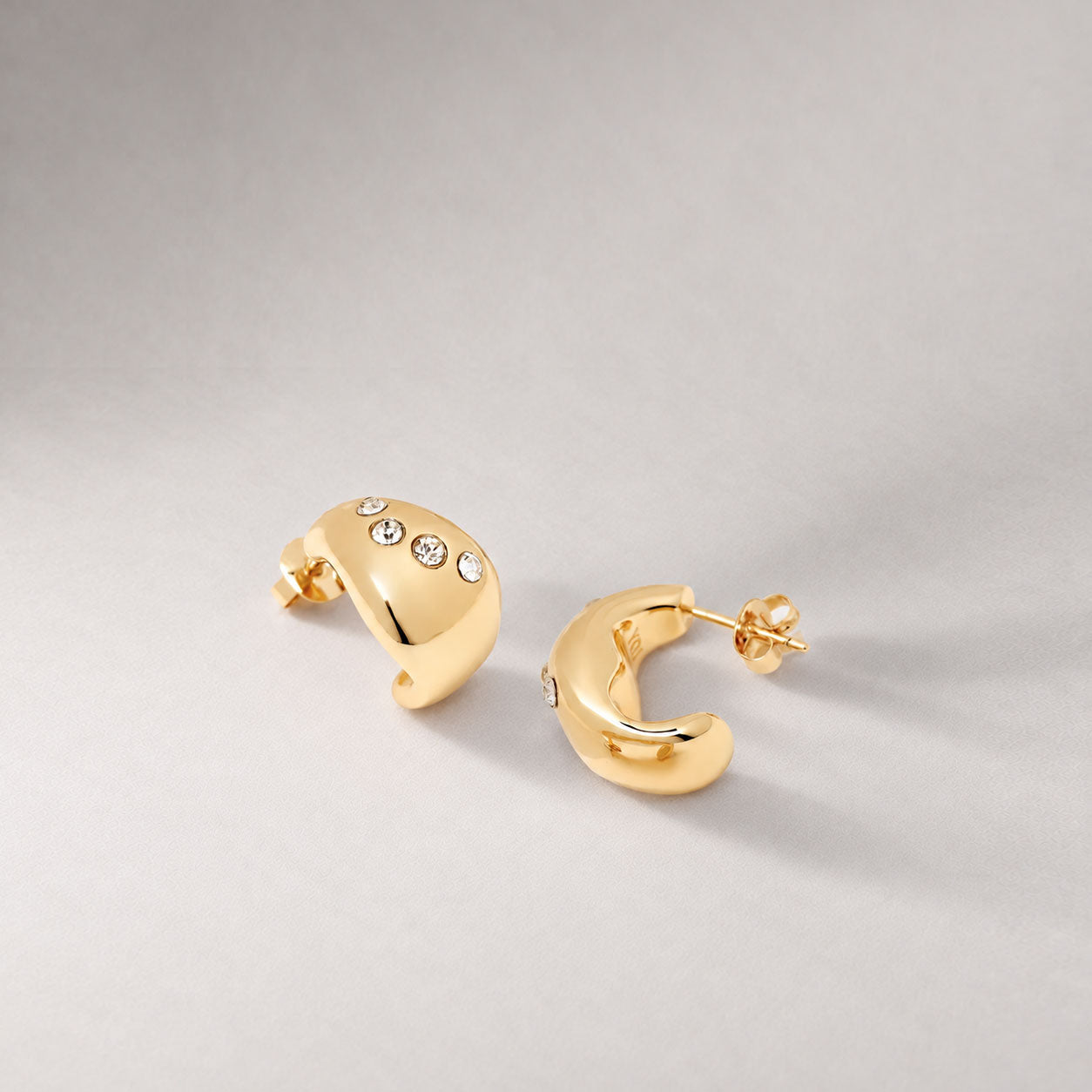 Remeni Crystal Chubby Hoop Earrings in Gold