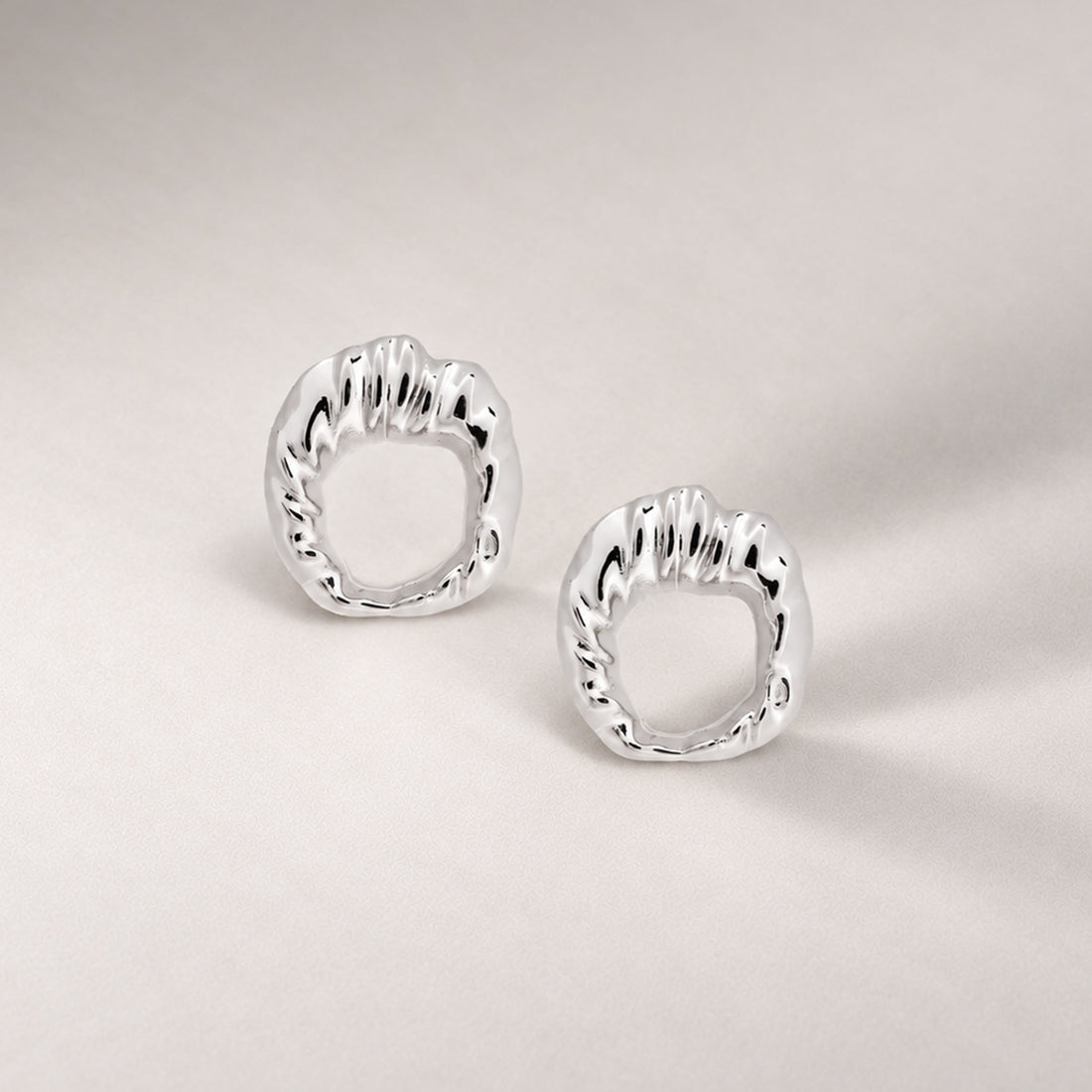 Iyun Face on Stud Earrings in Silver
