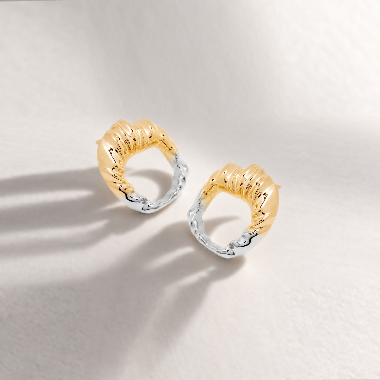 Iyun Face on Stud Earrings in Two Tone