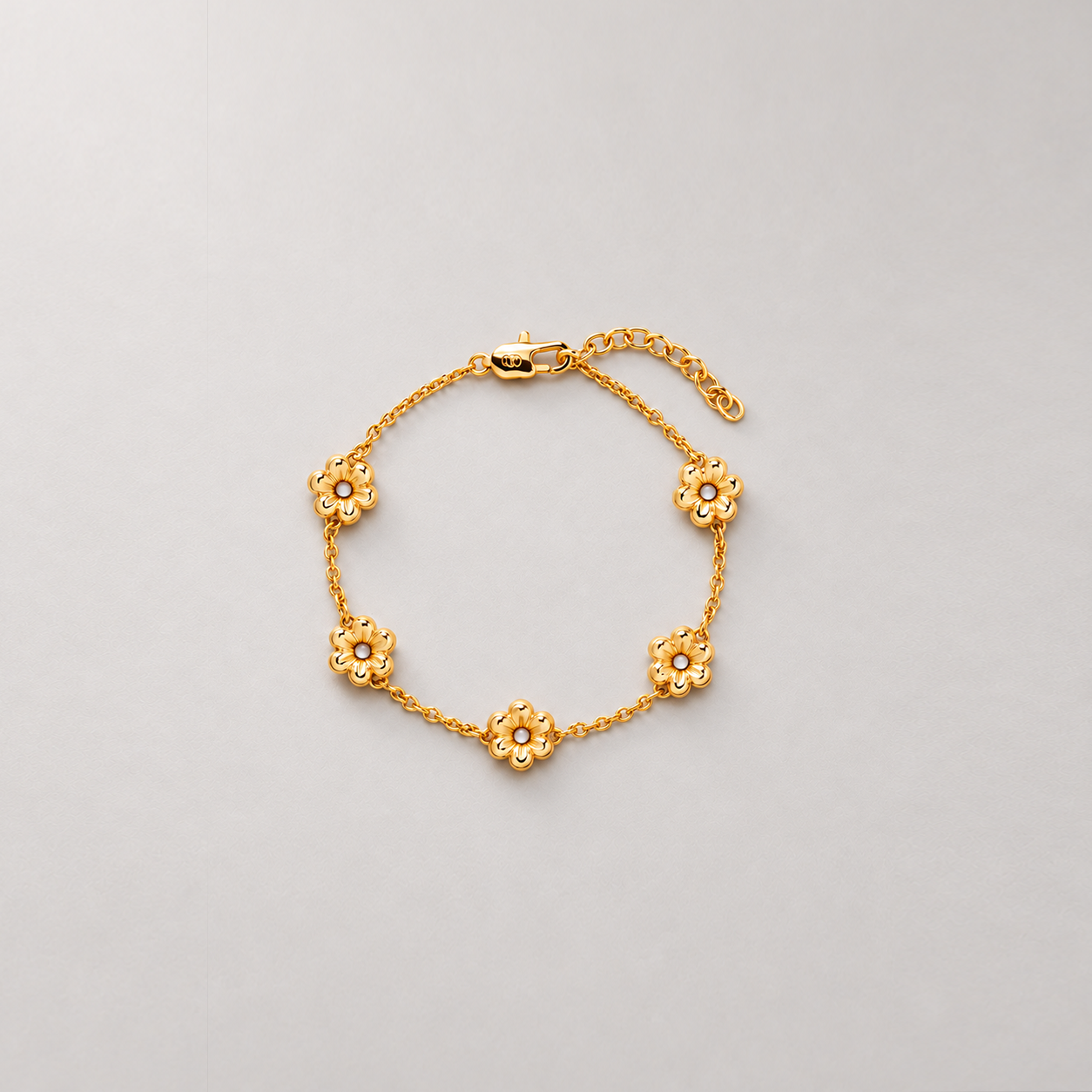 LULO MULTI FLOWER BRACELET IN GOLD