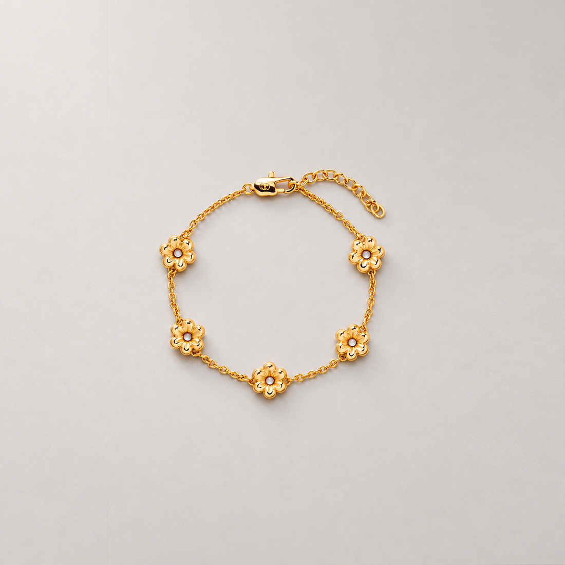 LULO MULTI FLOWER BRACELET IN GOLD