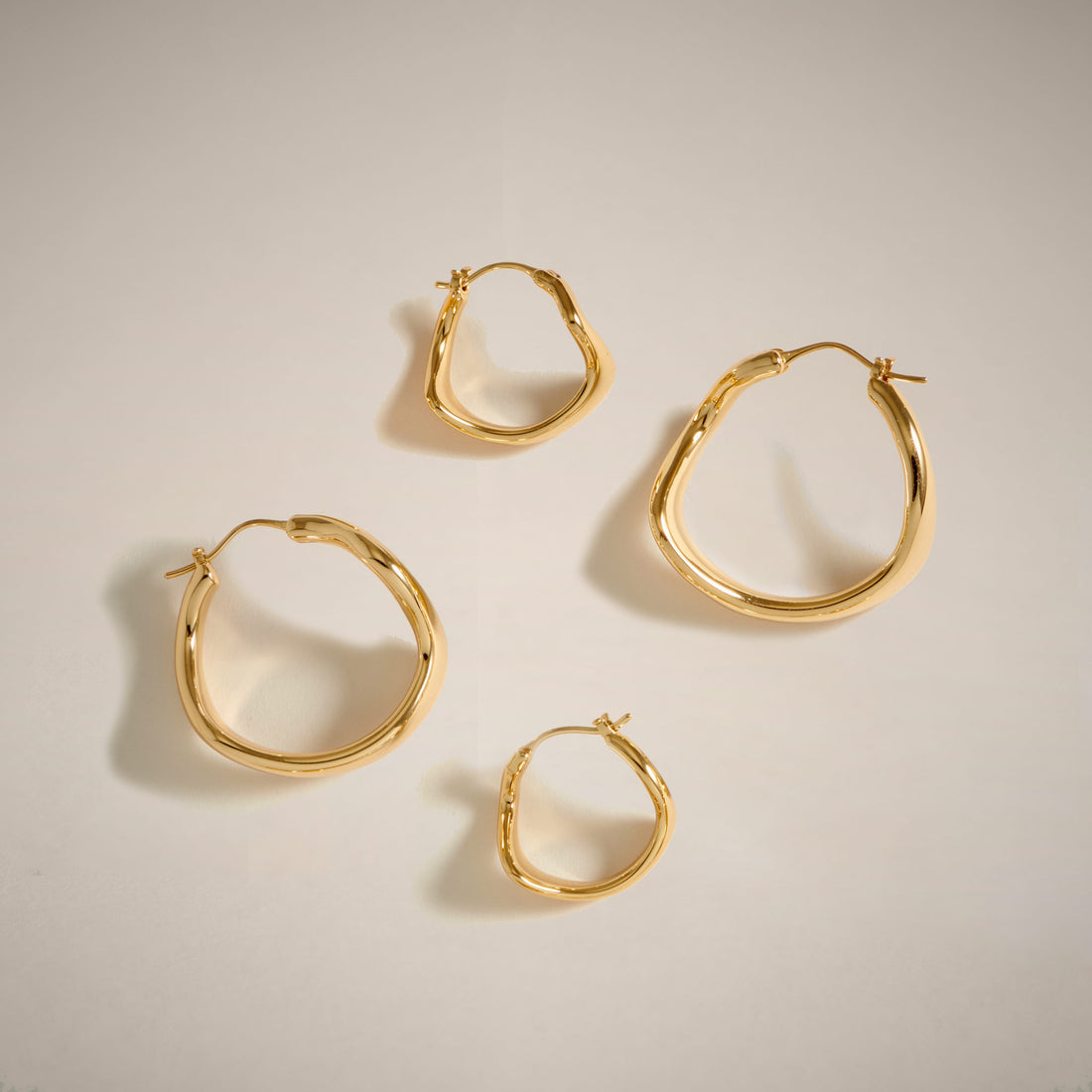 Curved Mini Pave Hoop Earrings in Gold