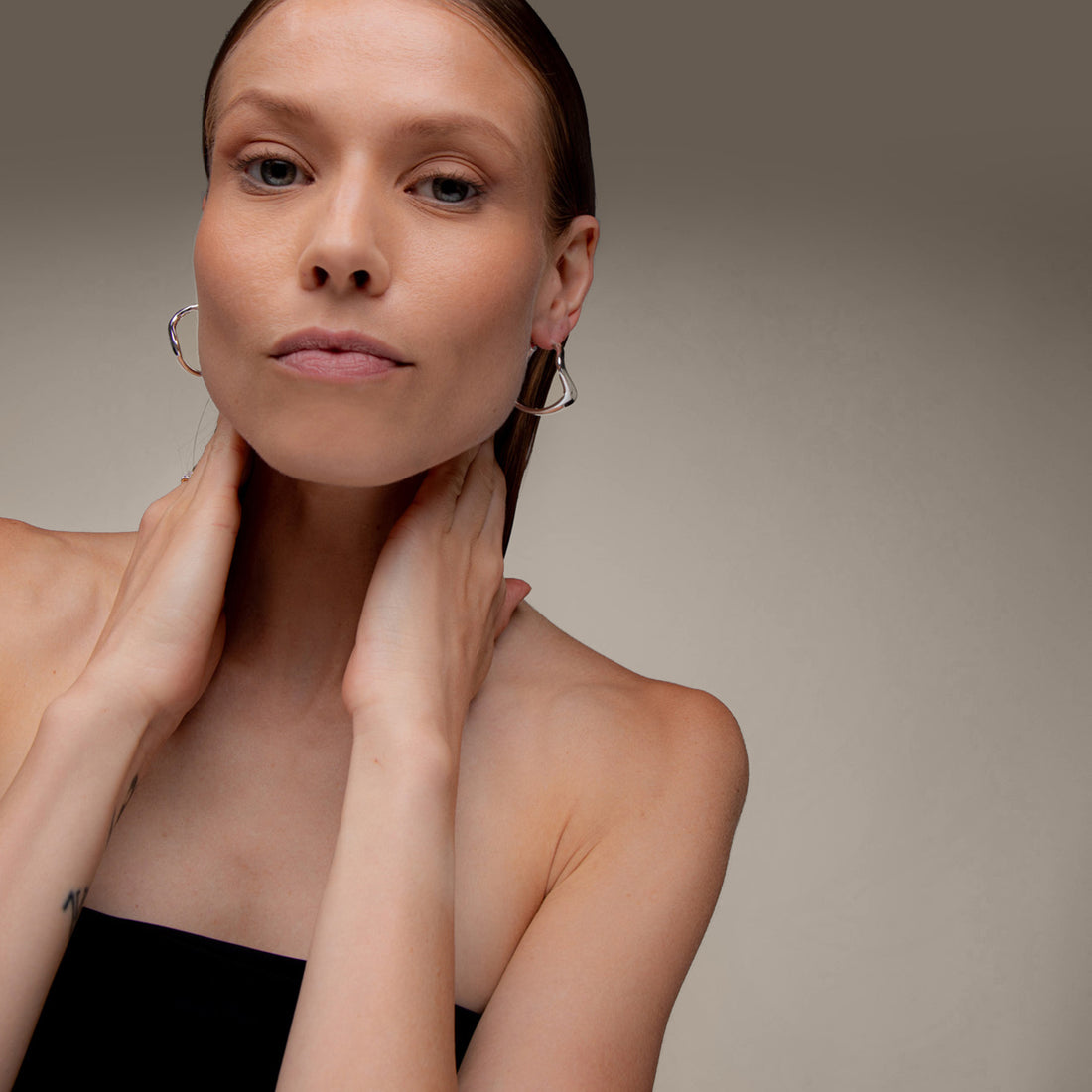 Curved Maxi Hoop Earrings in Silver