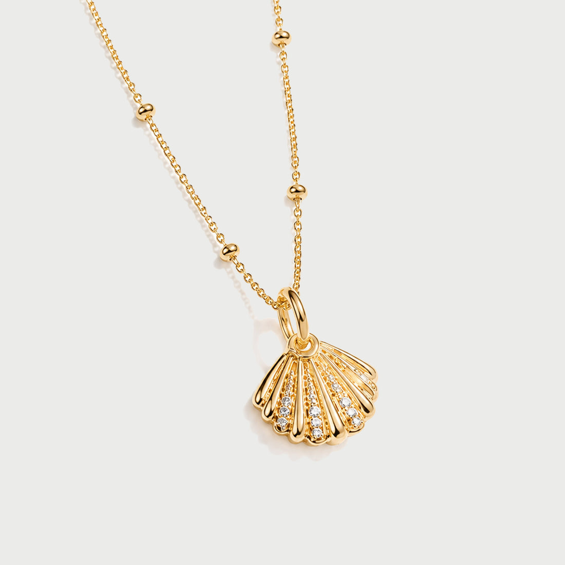 QUERO CRYSTAL PENDANT NECKLACE IN GOLD