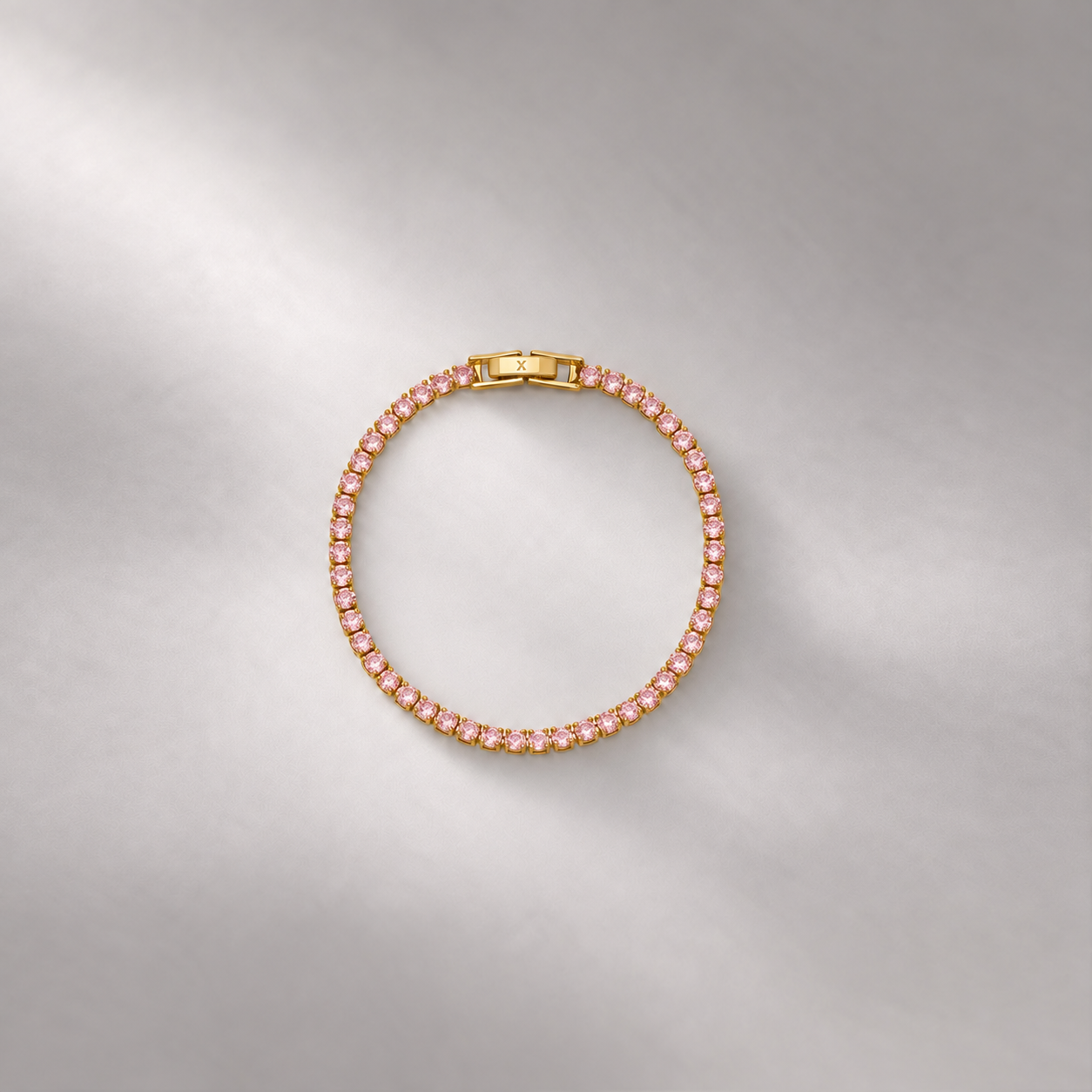TENNIS BRACELET IN GOLD AND PINK CRYSTALS