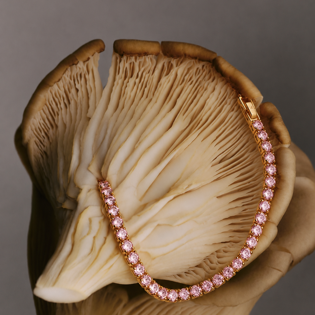 TENNIS BRACELET IN GOLD AND PINK CRYSTALS