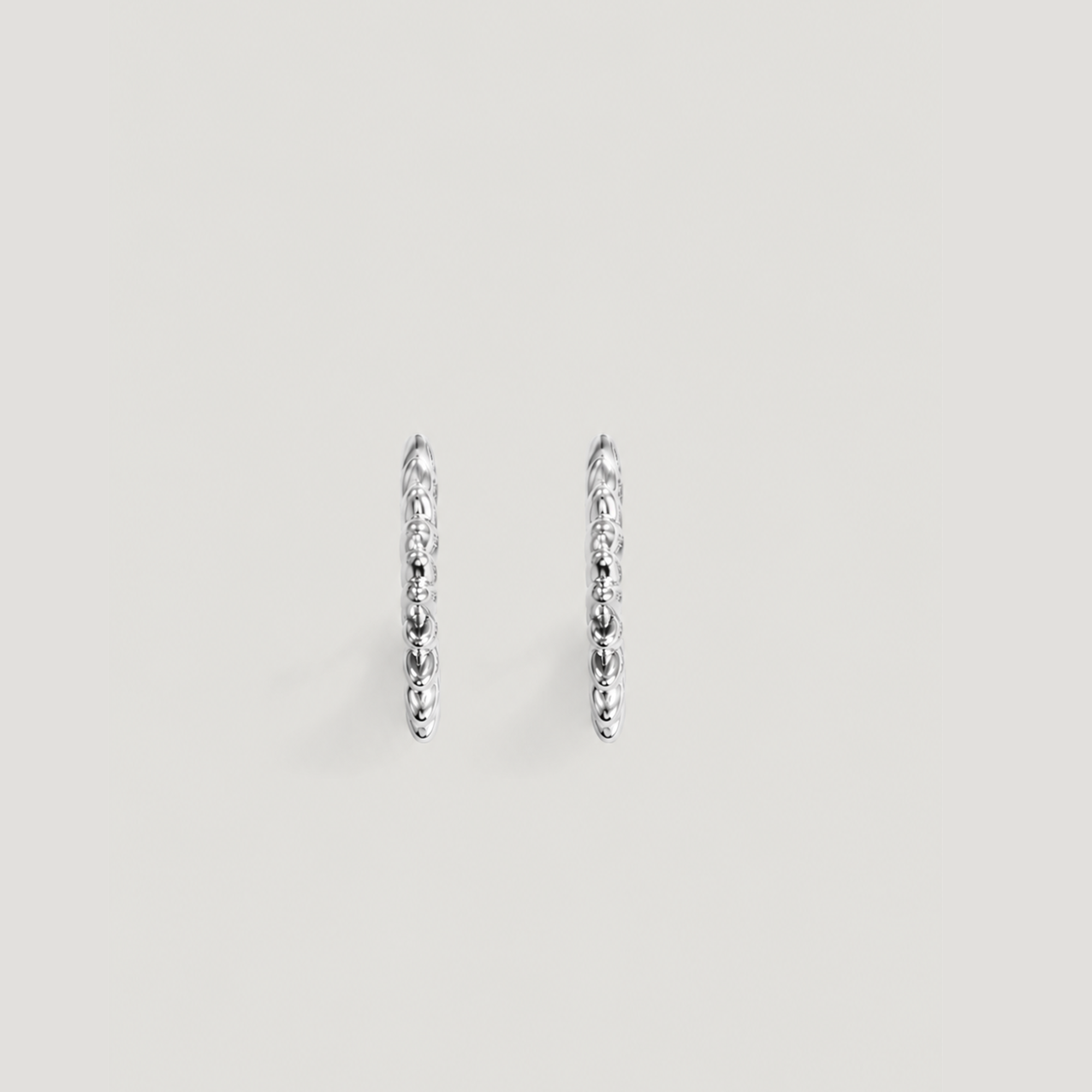 SUN CLAW MIDI HOOPS IN SILVER