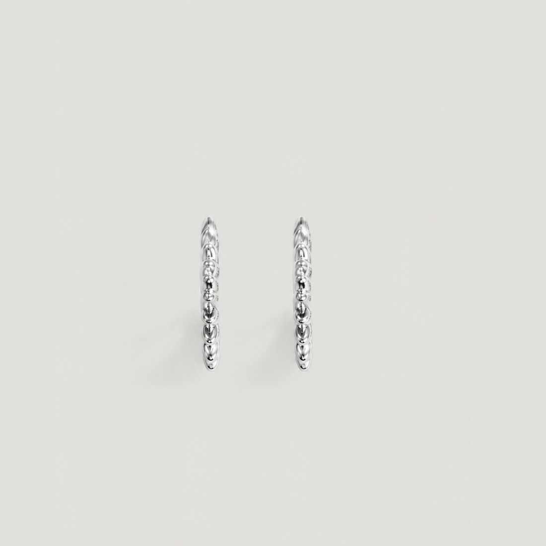 SUN CLAW MIDI HOOPS IN SILVER