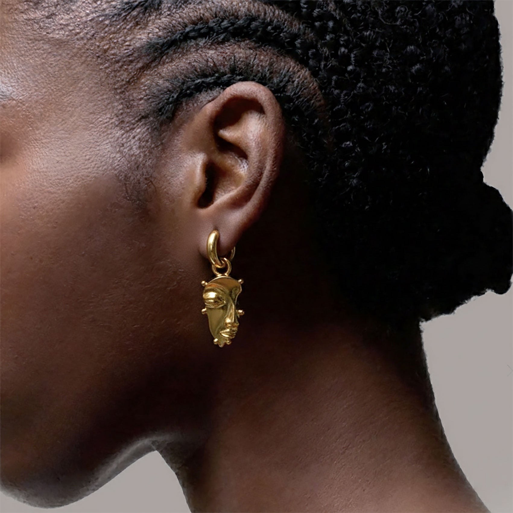 Visage Drop Hoop Earrings in Gold