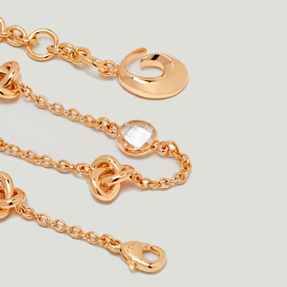 KNOT BRACELET IN GOLD AND CRYSTALS